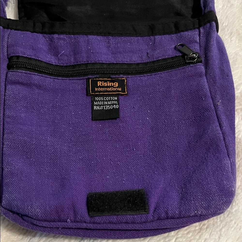 Rising International Purple Canvas Crossbody with Sun Motif - Picture 2 of 3